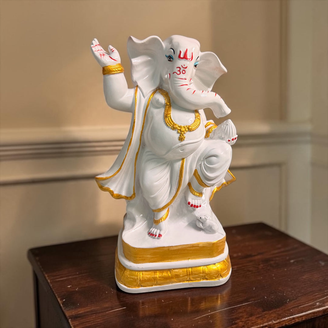 Cutncurve India Dancing Lord Ganesha Statue in white and golden composite marble finish, 26 cm height, decorative idol for home temple and home décor.