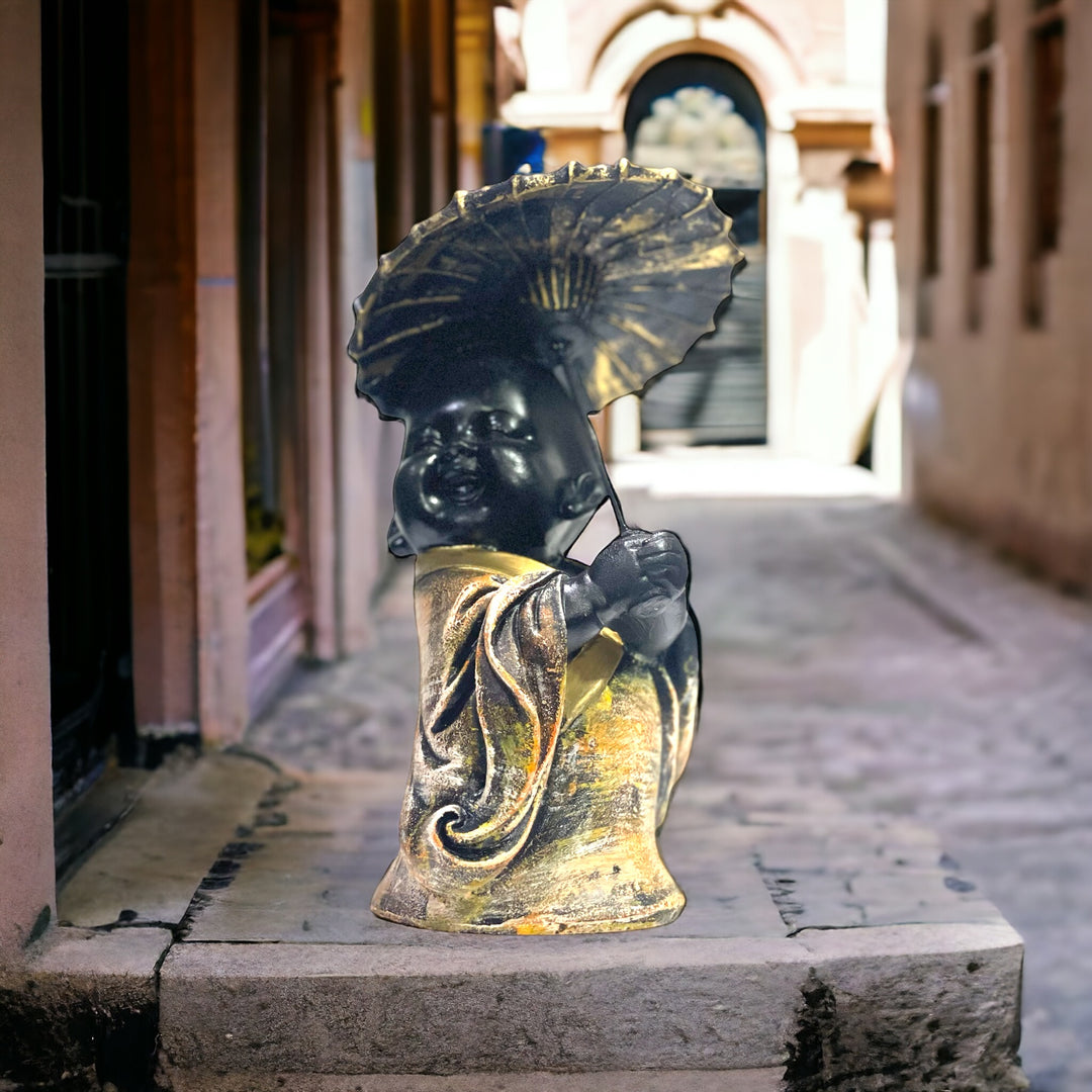 Baby Monk With Umbrella Showpiece