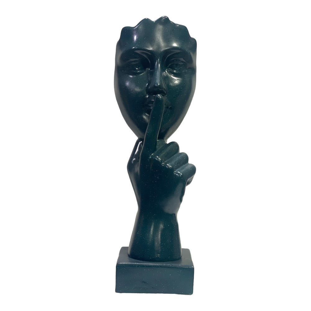 Abstract Instructing Silence Finger on Woman Face Statue Table Ascent